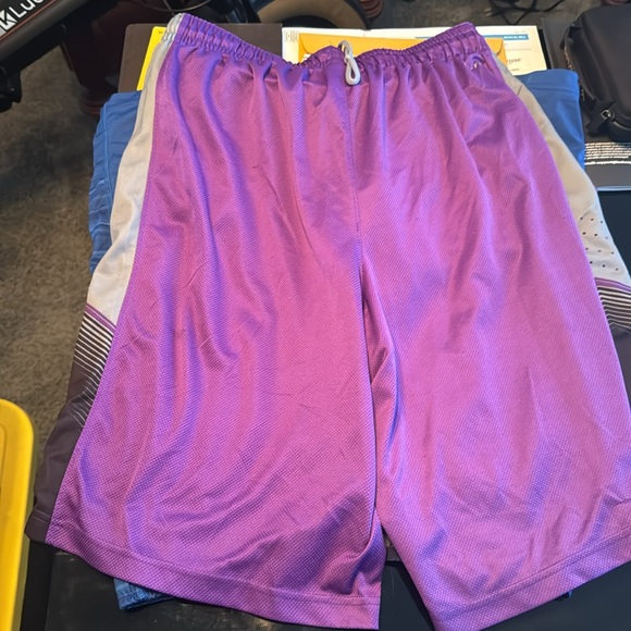 3 pairs of Nike shorts one purple one blue cut offe one flouresant yellow - Picture 8 of 9